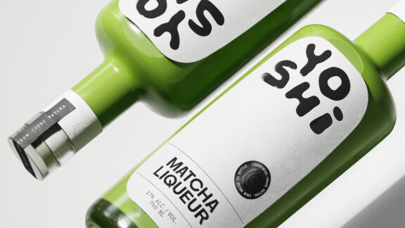 Close-up of Yoshi matcha liqueur bottle showcasing Saint-Urbain’s branding and packaging design.